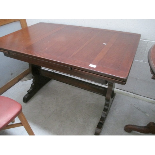 645 - A vintage ERCOL refectory style draw leaf dining table. Dimensions are W45