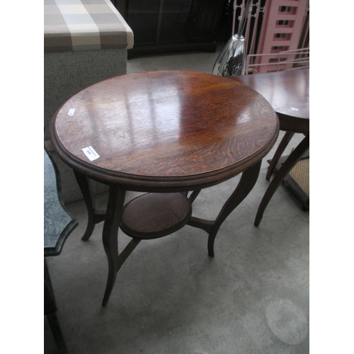 649 - A vintage oval oak 2 tier table