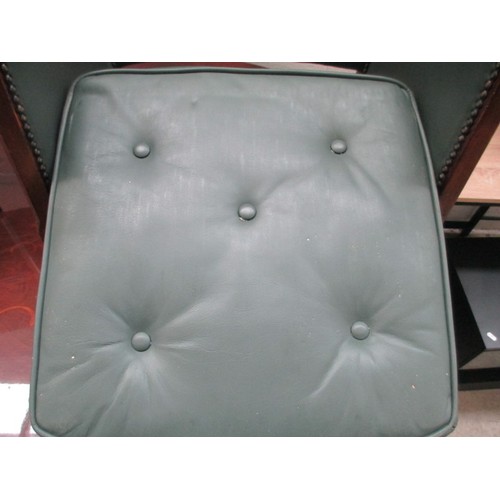 642 - A small vintage nursing tub chair with green leather cushion and panels