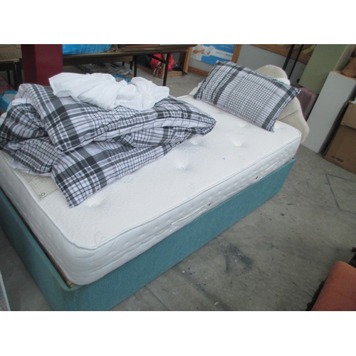 600 - An adjustable single bed with mattress and headboard