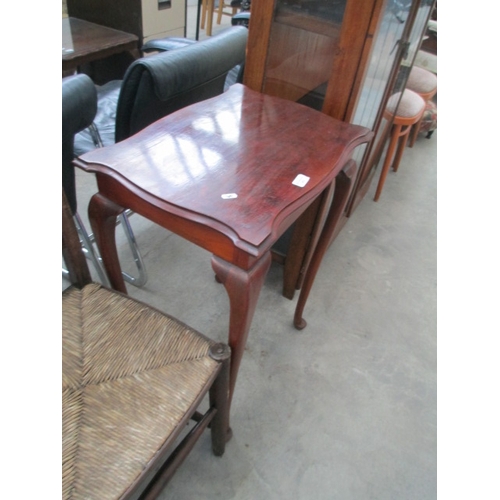 603 - A vintage mahogany window table