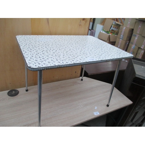 631 - A small retro Formica topped table