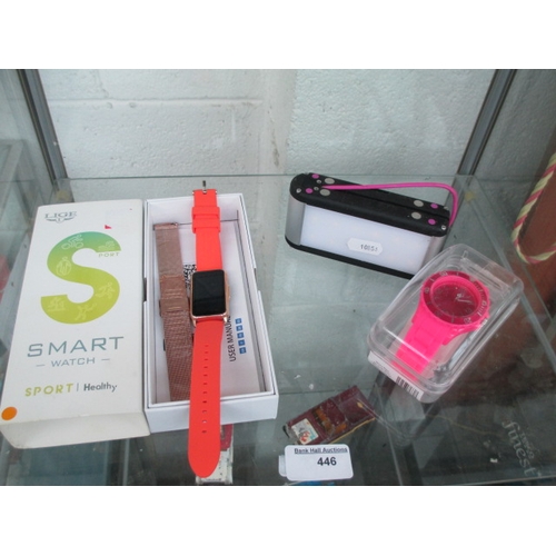 446 - Lot inc smart watch, power bank and pink watch