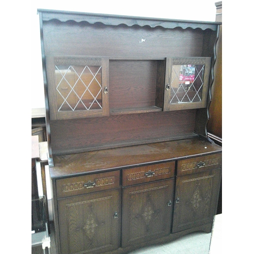 635 - A large vintage 3 drawer dresser with small lead glazed upper cabinets