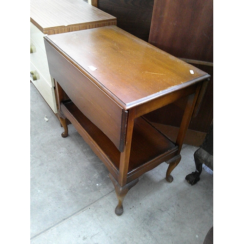 638 - A vintage 2 tier drop leaf tea trolley