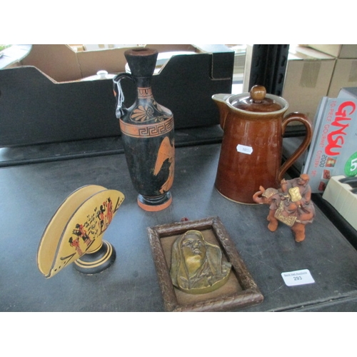 293 - Lot inc stoneware jug, Greel pottery, elephant ornament and brass Virgin Mary in wood frame