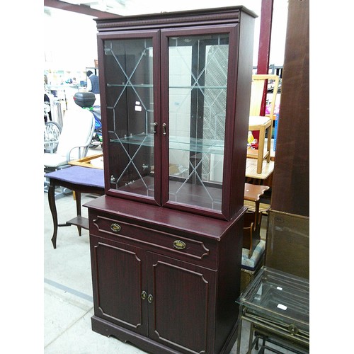 646 - A small vintage wall unit with glazed cabinet