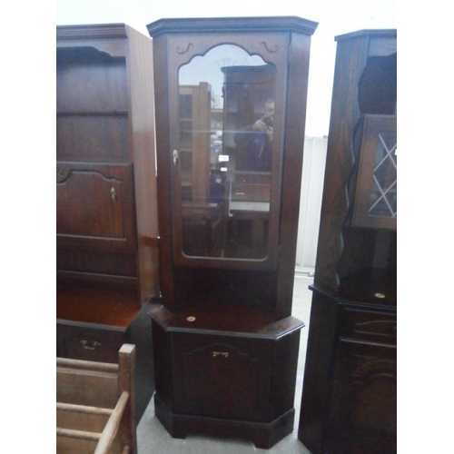 626 - A vintage glazed corner cabinet