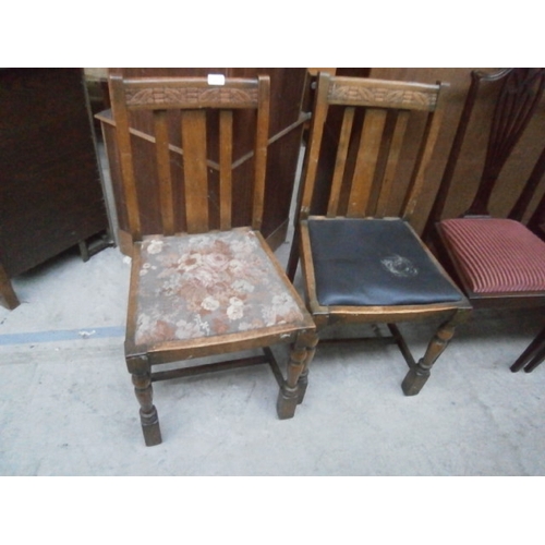 629 - A pair of carved vintage didning chairs