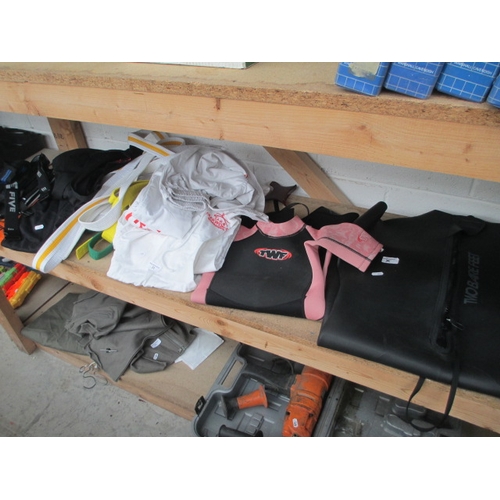 23 - Lot inc wetsuits, Taekwan-do suits and belts, etc