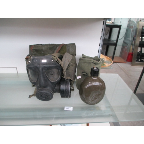 180 - Military gas mask and water bottle