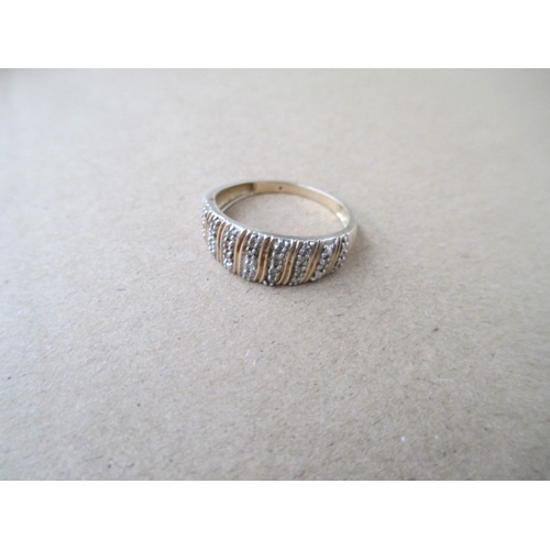 240 - 9ct gold ring with white stones, weight 1.8 grams