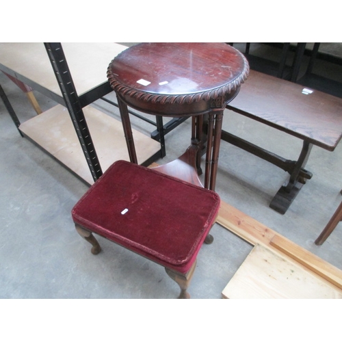 615 - A vintage mahogany lamp table and a small stool