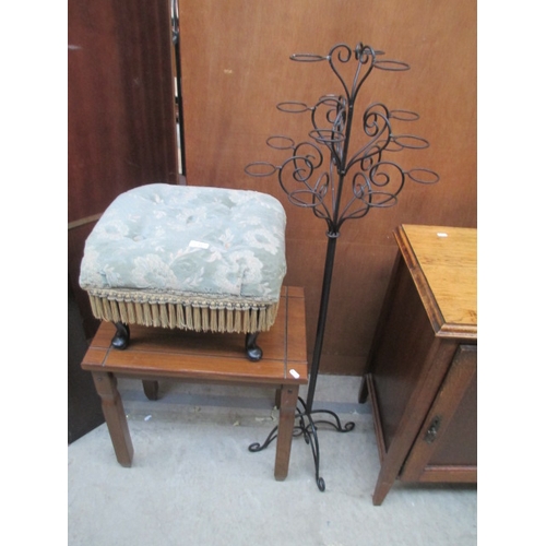 631 - A vintage upholstered stool, a small table and a decorative stand