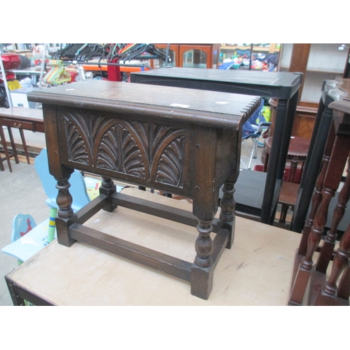 658 - A small vintage carved oak storage box stool