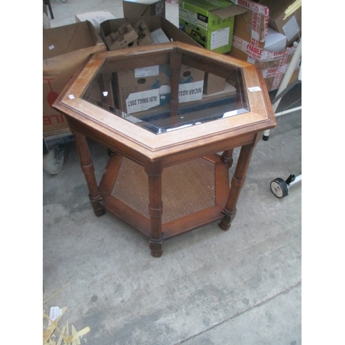 660 - A vintage hexagonal table with glass top insert