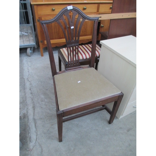 663 - A vintage mahogany chair with upholstered seat