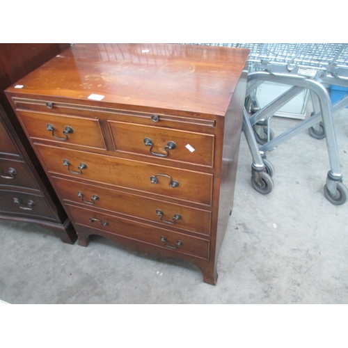 671 - A small vintage 2 over 3 drawer chest with leather topped pull-out shelf