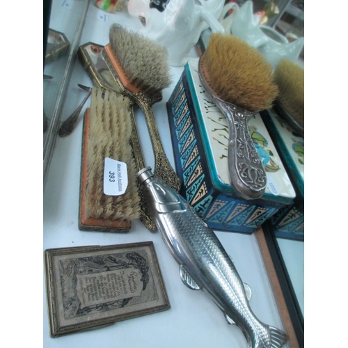 393 - Lot inc fish form hip flask, old tin, vintage brushes and mirror, etc