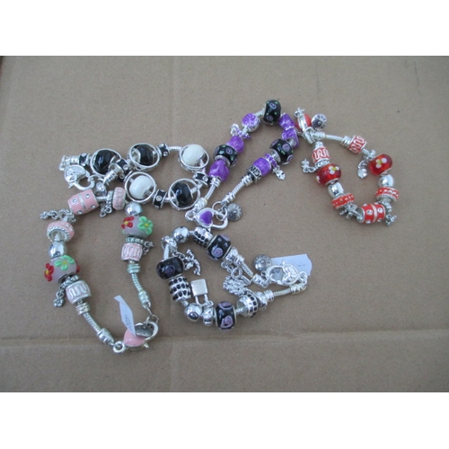 236 - Five assorted charm bracelets