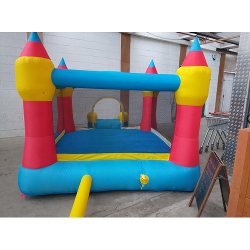 70 - Inflatable bouncy castle with blower in working order