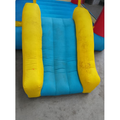 70 - Inflatable bouncy castle with blower in working order