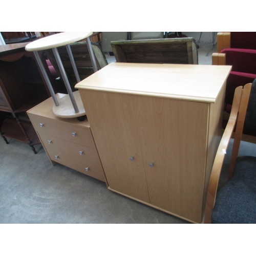 648 - A small 3 drawer chest, a matching 2 door cupboard and a small stand on casters