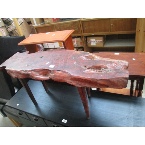 667 - A small rustic style timber cut coffee table