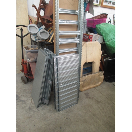 601 - A quantity of metal racking with shelves