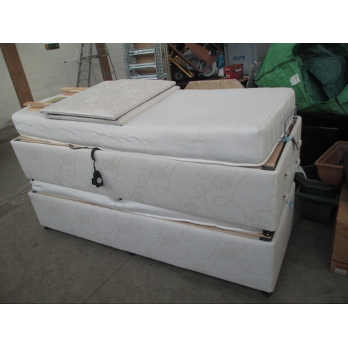 602 - A pair of electrically adjustable single divans, connectable for double bed. Includes mattresses and... 