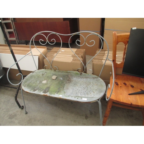 605 - A small vintage metal garden bench