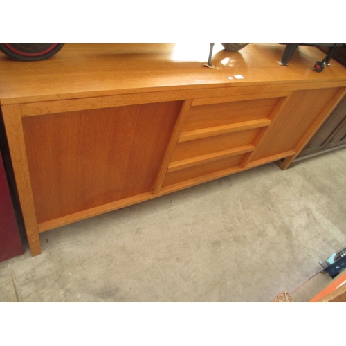 621 - A modern light oak 3 drawer sideboard