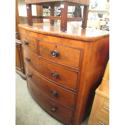 642 - A large vintage bow front flame mahogany 2 over 3 drawer chest - a/f handles