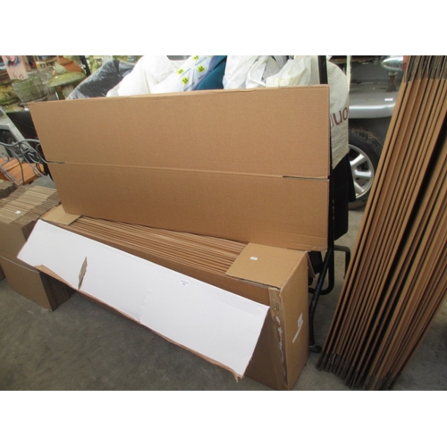 653 - A quantity of as-new flat packed cardboard boxes