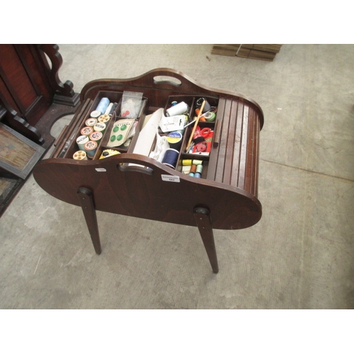 662 - A vintage roll top sewing box with contents