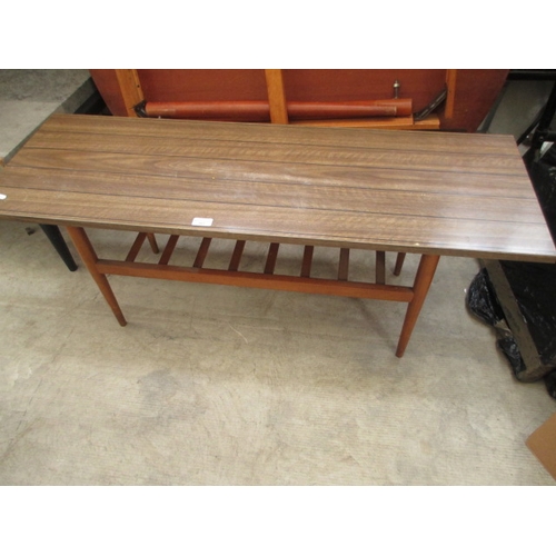 663 - A retro Formica topped coffee table