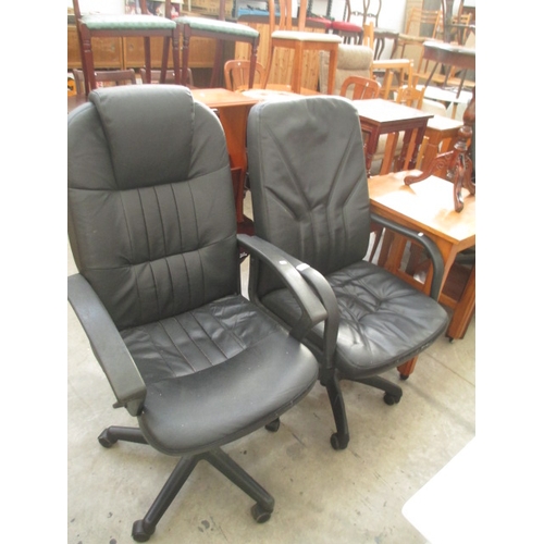 676 - 2 x modern padded swivel office chairs