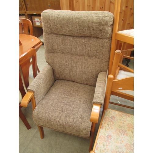 686 - A modern wood framed upholstered armchair