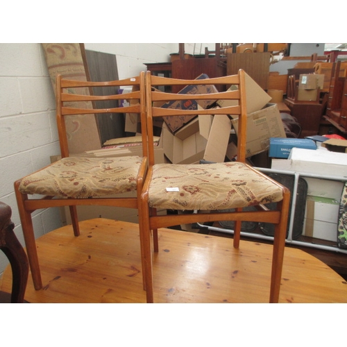 691 - A pair of retro dining chairs