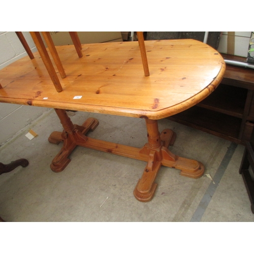 692 - A large pine twin pedestal dining table