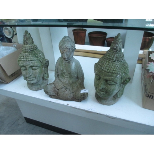 257 - Three cast concrete Buddha ornaments