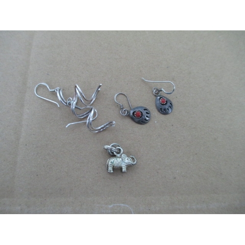 286 - Two sets of silver stamped earrings and silver stamped elephant pendant