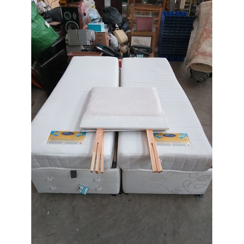 602 - A pair of electrically adjustable single divans, connectable for double bed. Includes mattresses and... 