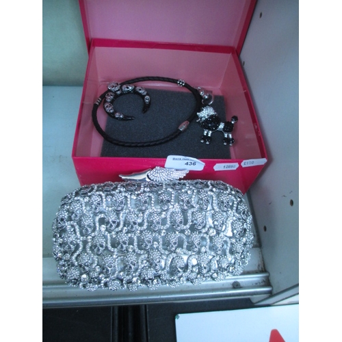 436 - Lot inc Butler & Wilson clutch bag, necklace and keyring