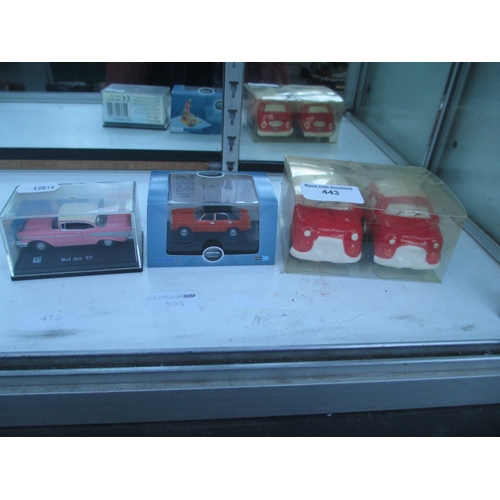 443 - Two boxed diecast cars and novelty salt & pepper pots