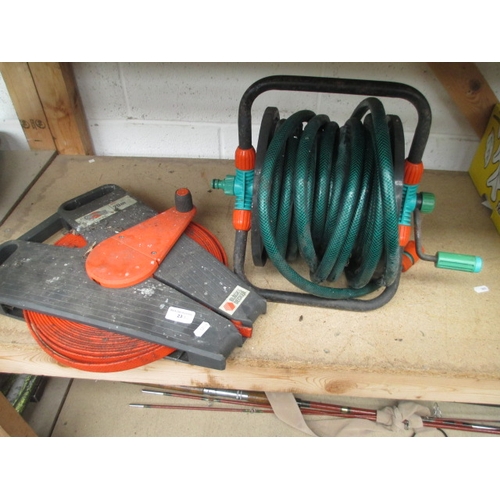 23 - Two assorted hosepipe and reel sets