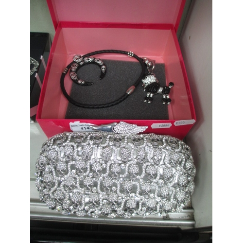 414 - Lot inc Butler & Wilson clutch bag, necklace and keyring