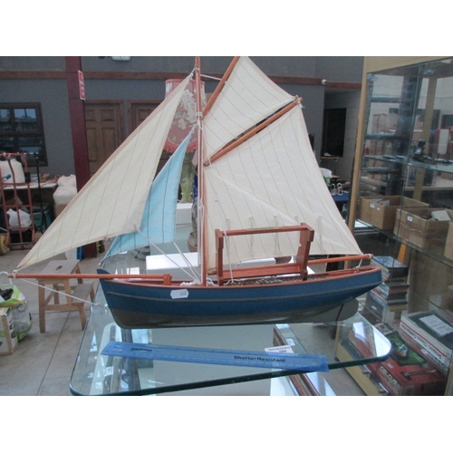 286 - Model wooden boat with stand