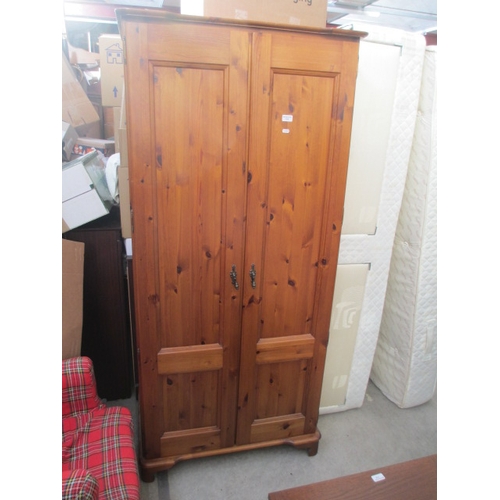 723 - A 2 door pine wardrobe