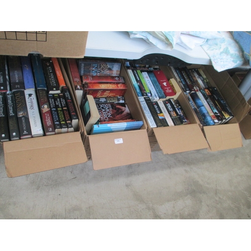 179 - Four boxes of assorted books